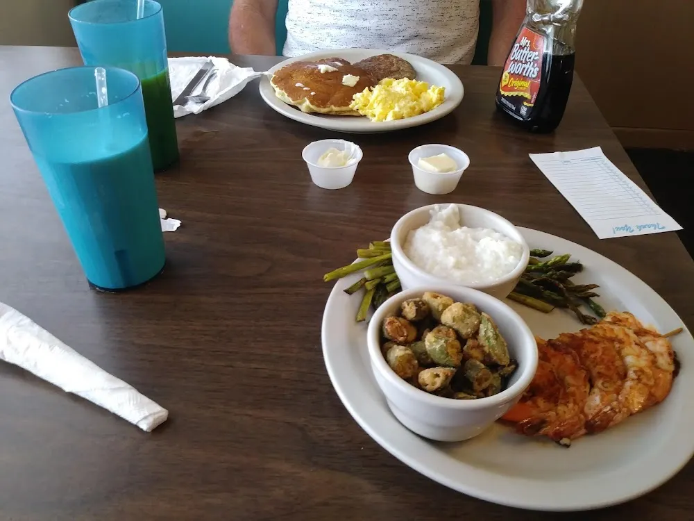 Grilled Shrimp with Grits Asparagus and Fried Okra Also Scrambled Eggs and Pancakes